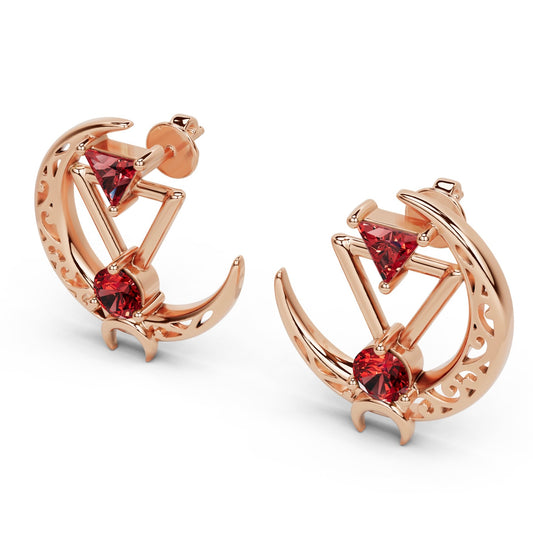 Rose gold crescent moon triangle earrings with gemstones.