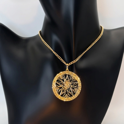 Enhanced gold Celtic rose pentacle pendant close-up on a black bust with subtle sparkle