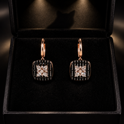 Rose-gold onyx and diamond square earrings in a black velvet jewelry box